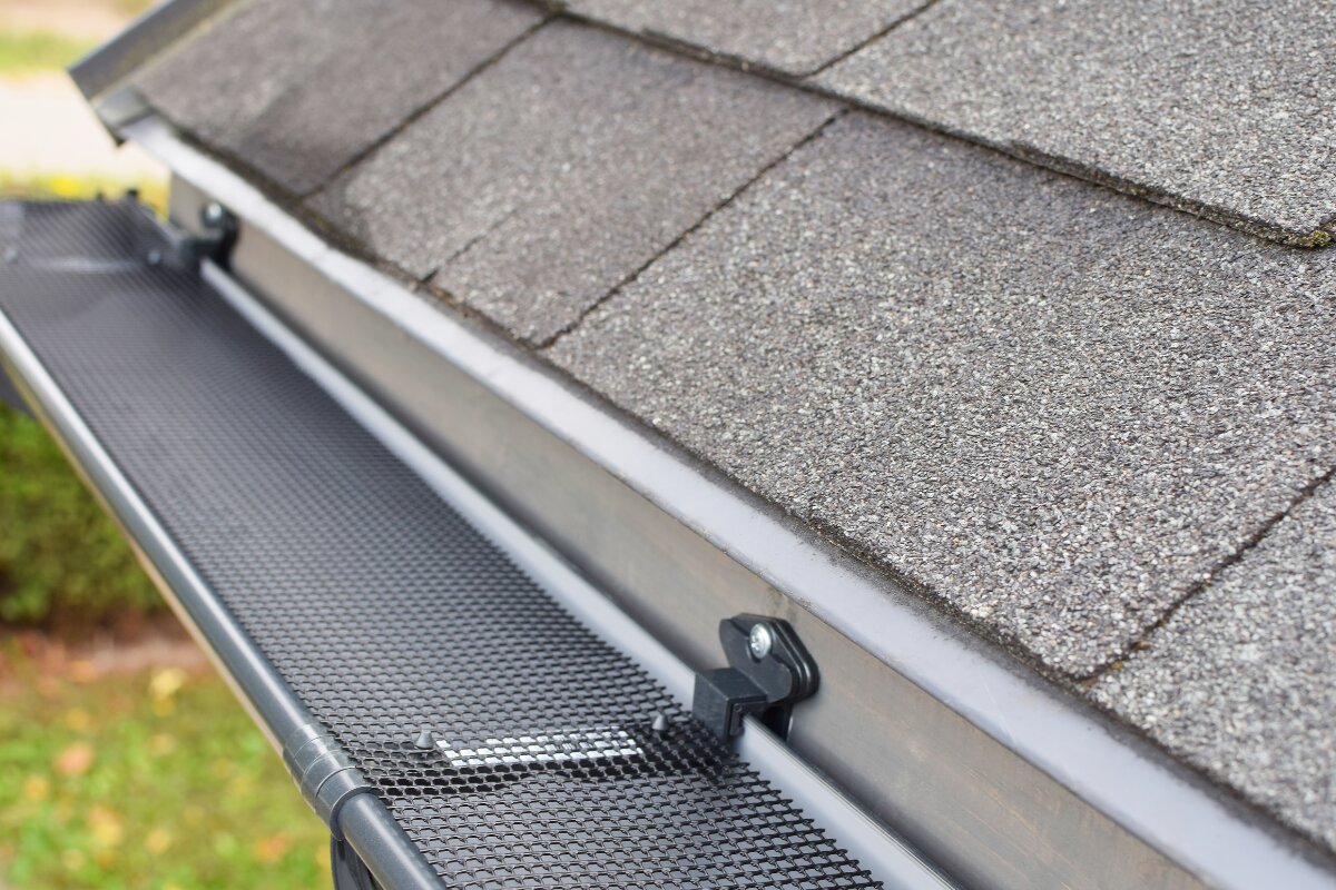 Gutter with leaf guard mesh installed